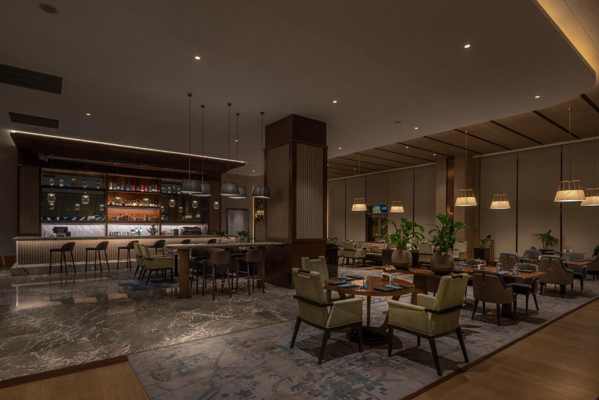 Hilton Tashkent City Екстериор снимка The Lounge at KLIA