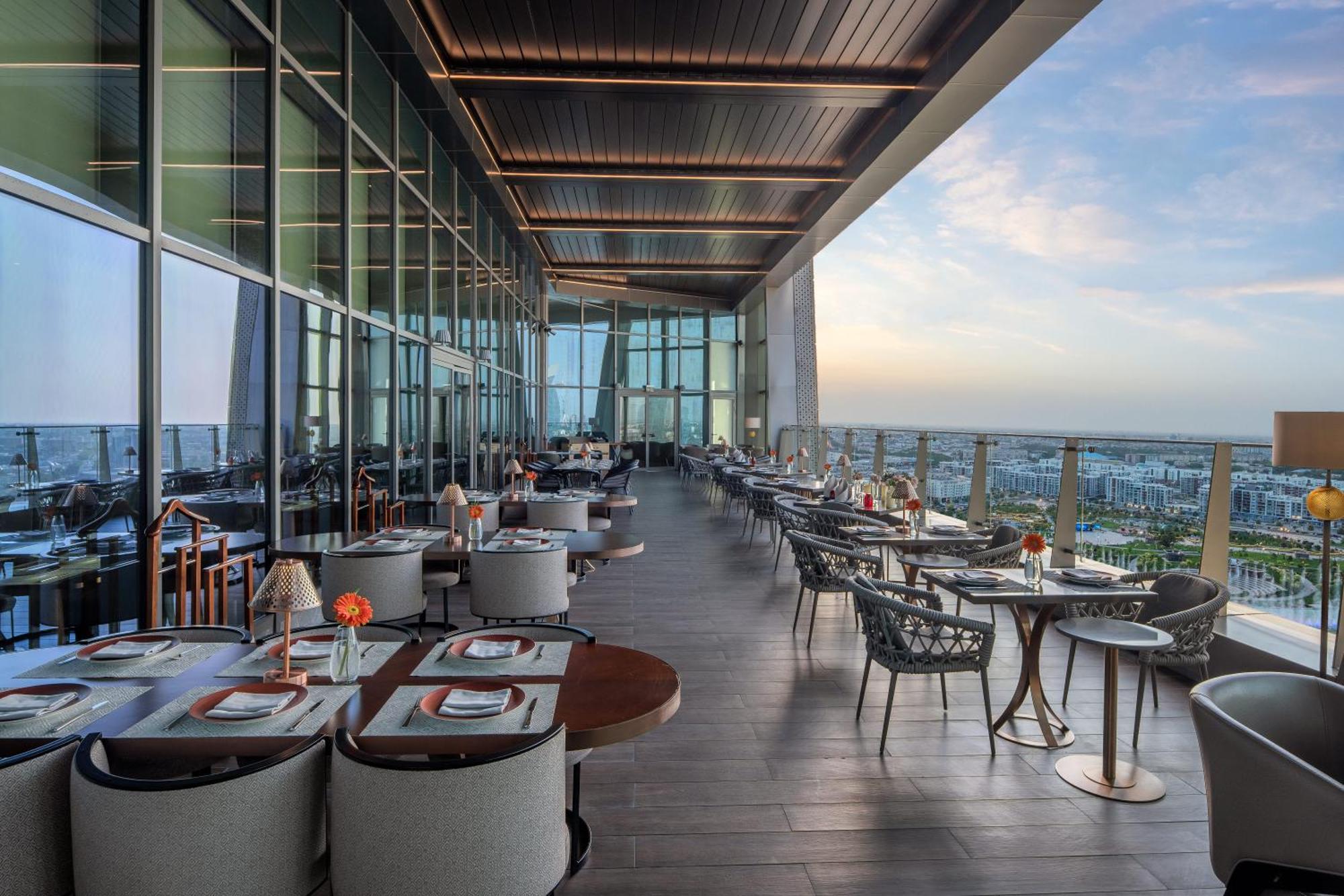 Hilton Tashkent City Екстериор снимка The 360° Restaurant
