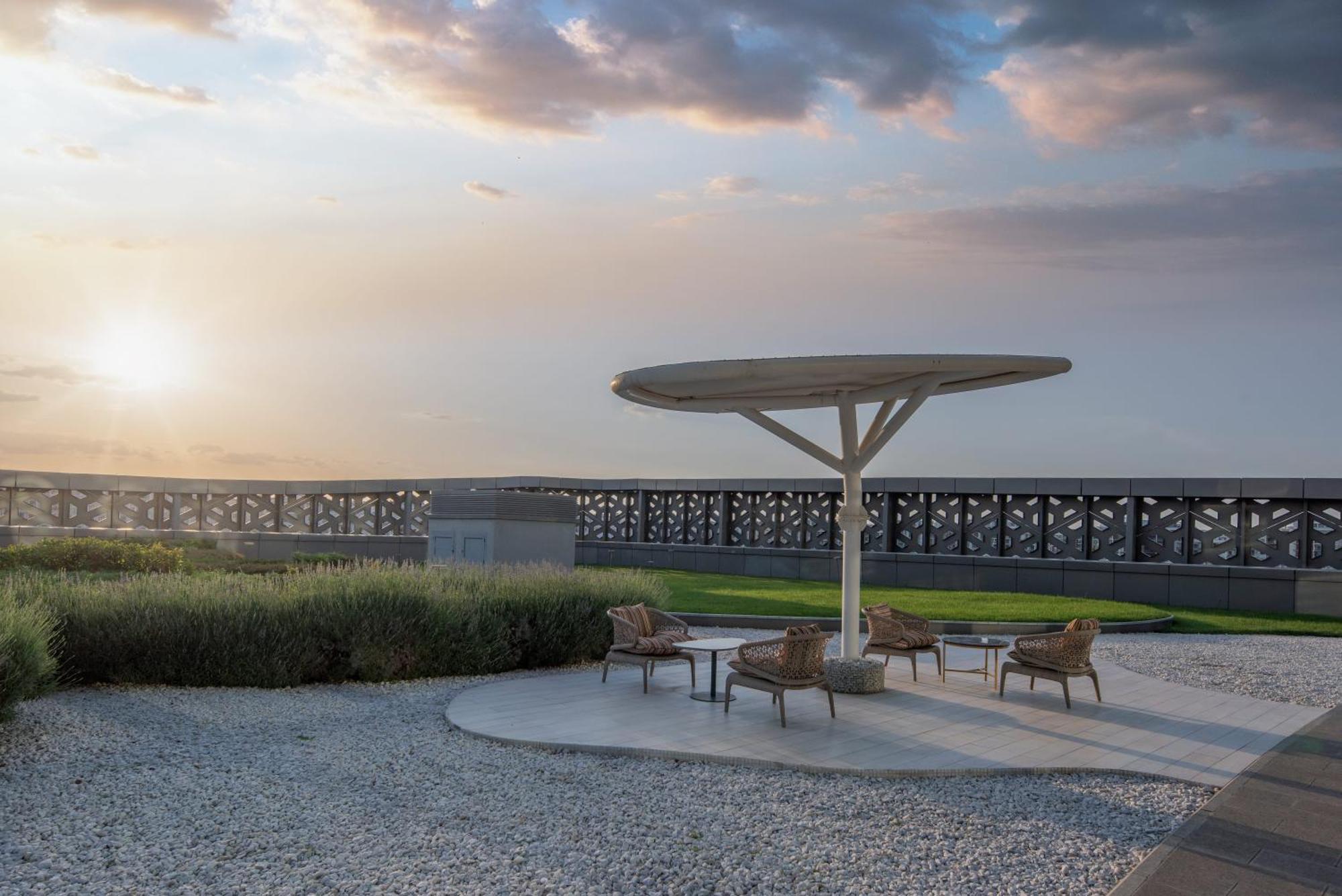 Hilton Tashkent City Екстериор снимка The rooftop garden