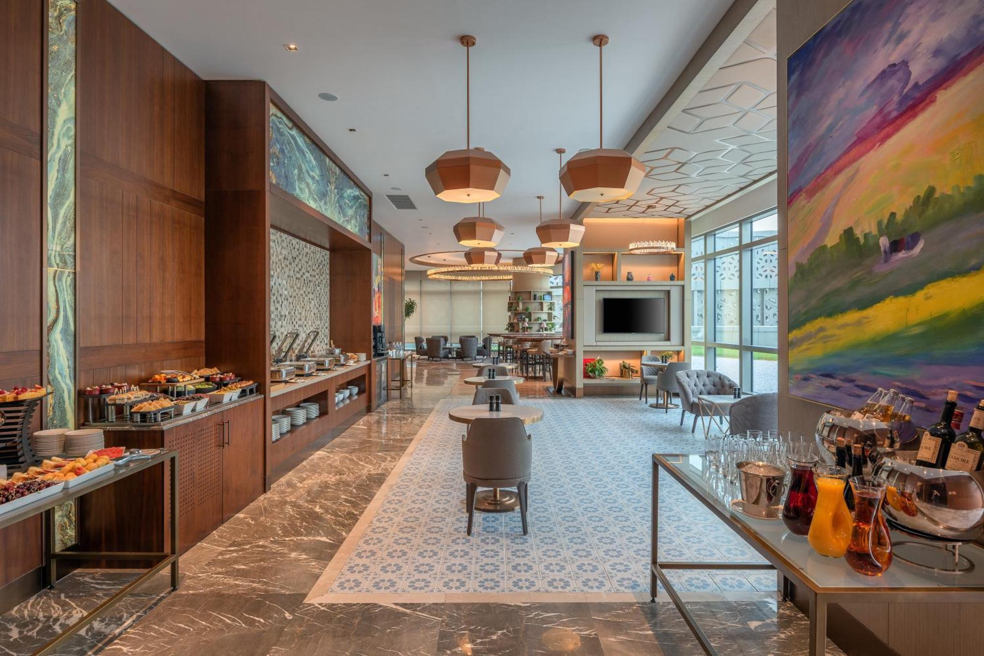 Hilton Tashkent City Екстериор снимка The Lounge at the airport