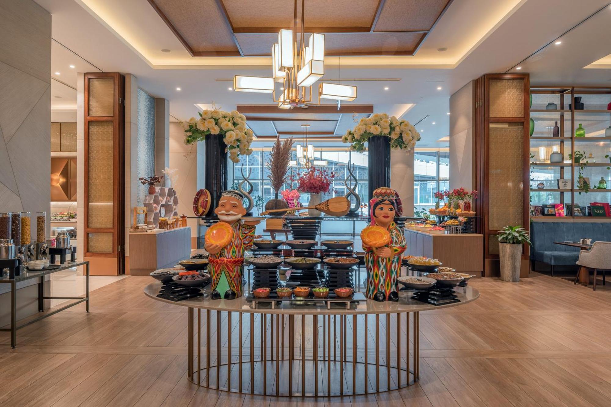 Hilton Tashkent City Екстериор снимка The Lounge at the airport