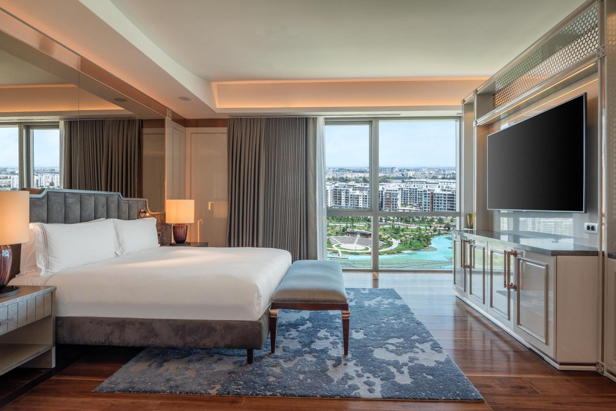 Hilton Tashkent City Екстериор снимка A bedroom at the hotel