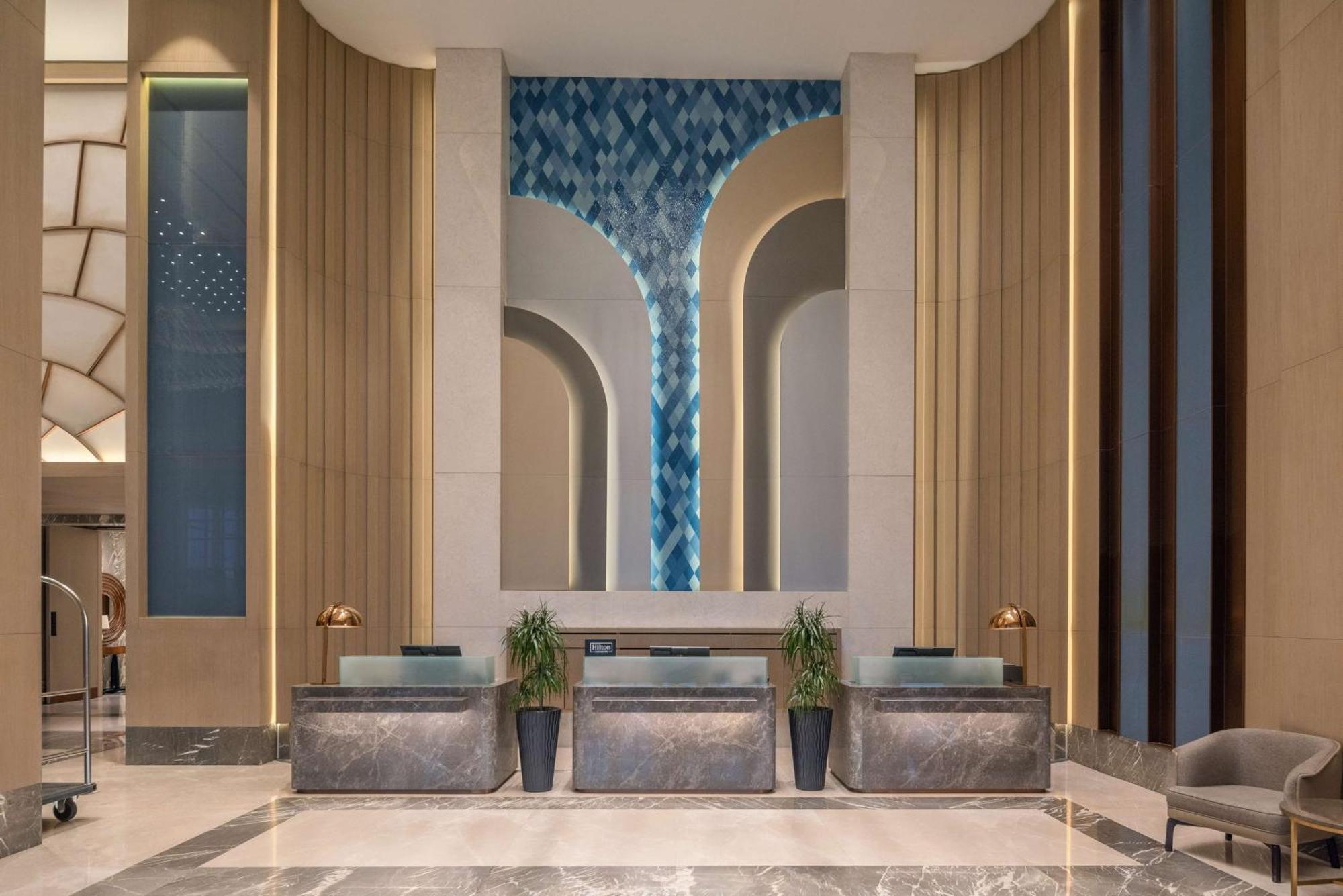 Hilton Tashkent City Екстериор снимка The lobby of the hotel